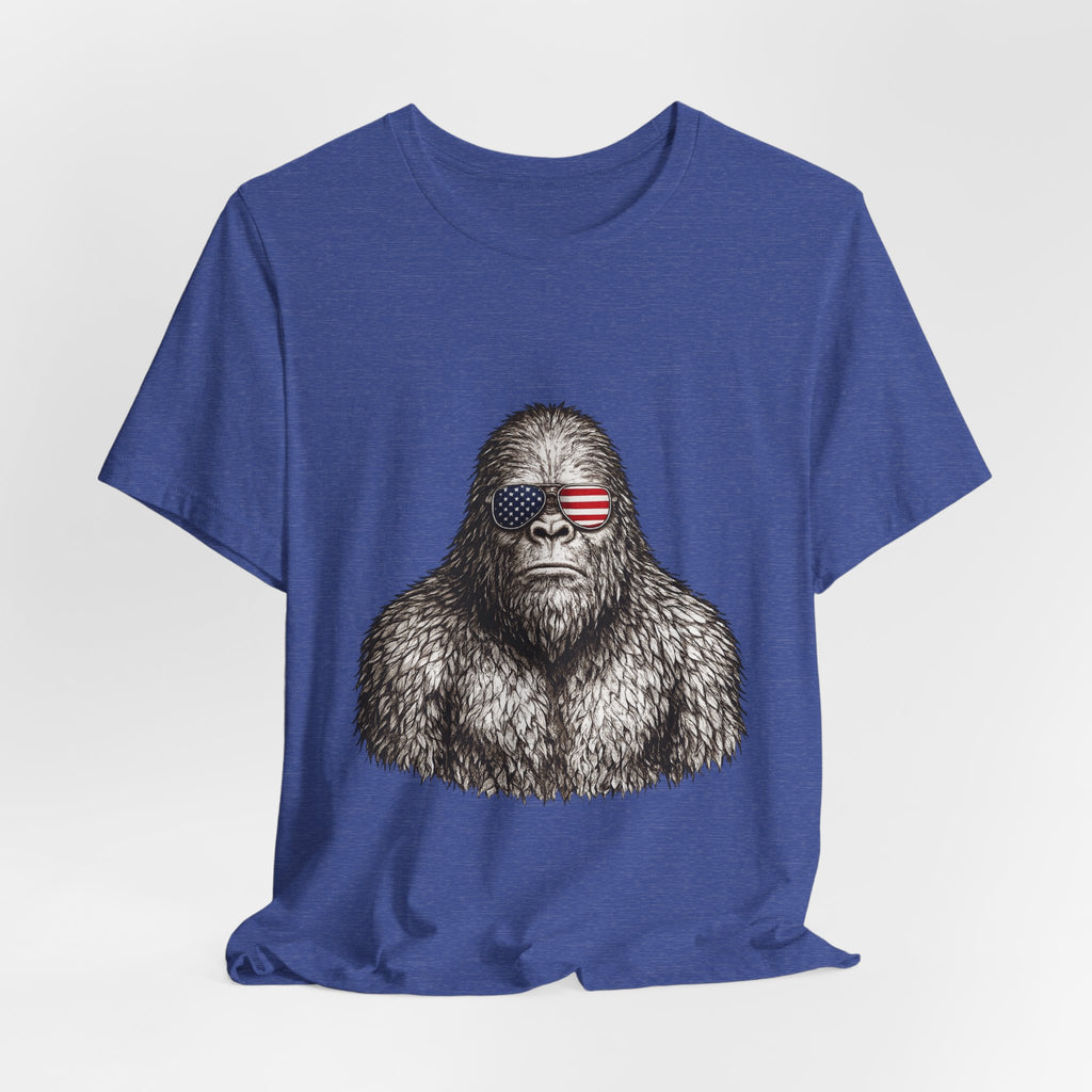 Patriotic Sasquatch Tee — Bigfoot Wearing American Flag Sunglasses